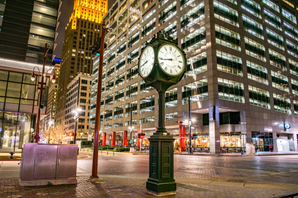 Historic City Clock At The Intersection Of Main Street And Texas Street At Night (Downtown Houston) Houston, Texas, USA
